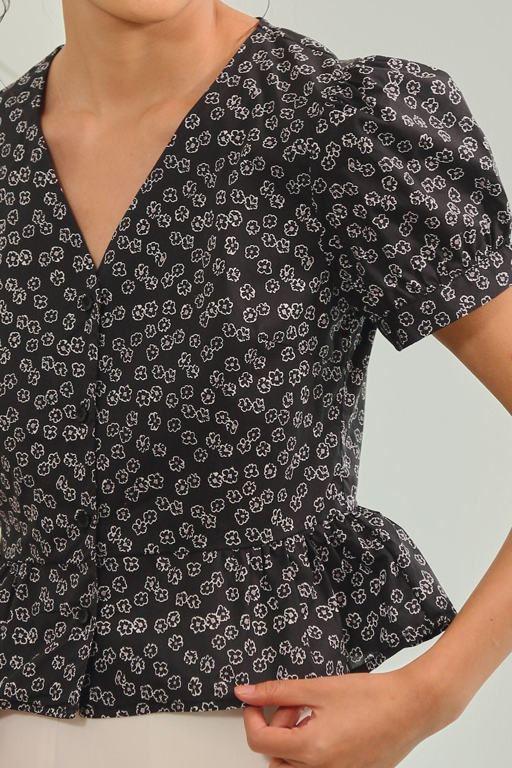 Melura Floral Peplum Top in Black Bloom - Image 2