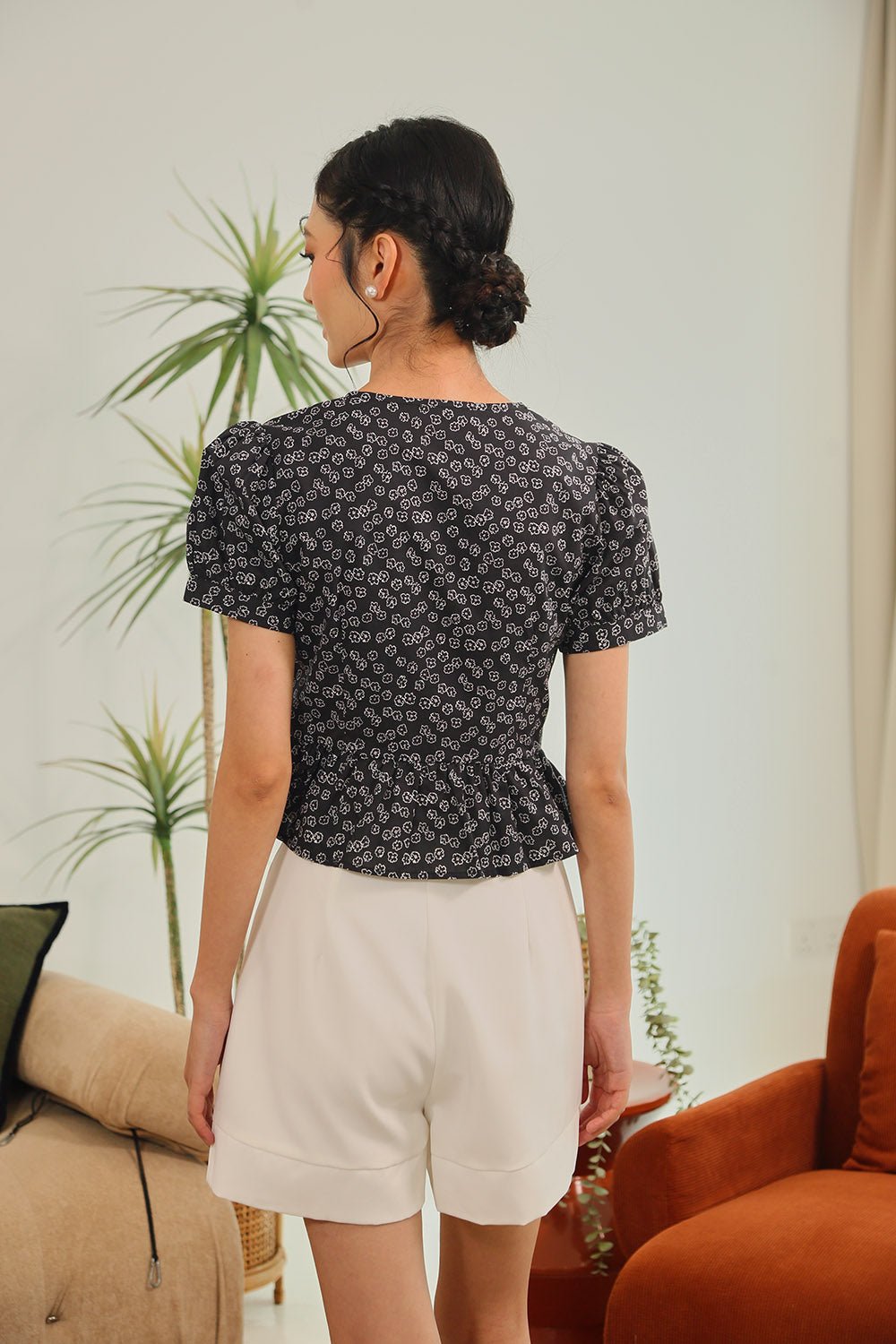 Melura Floral Peplum Top in Black Bloom - Image 5